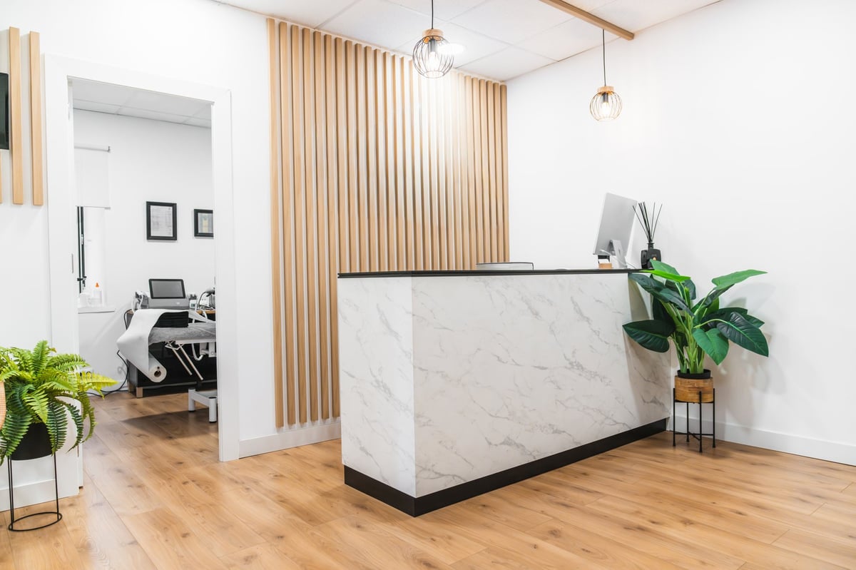 The bright, welcoming reception area at Valencia Family Medicine